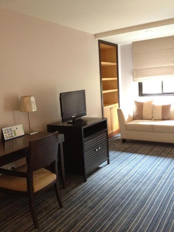 Gardengrove Suites Bangkok Værelse billede